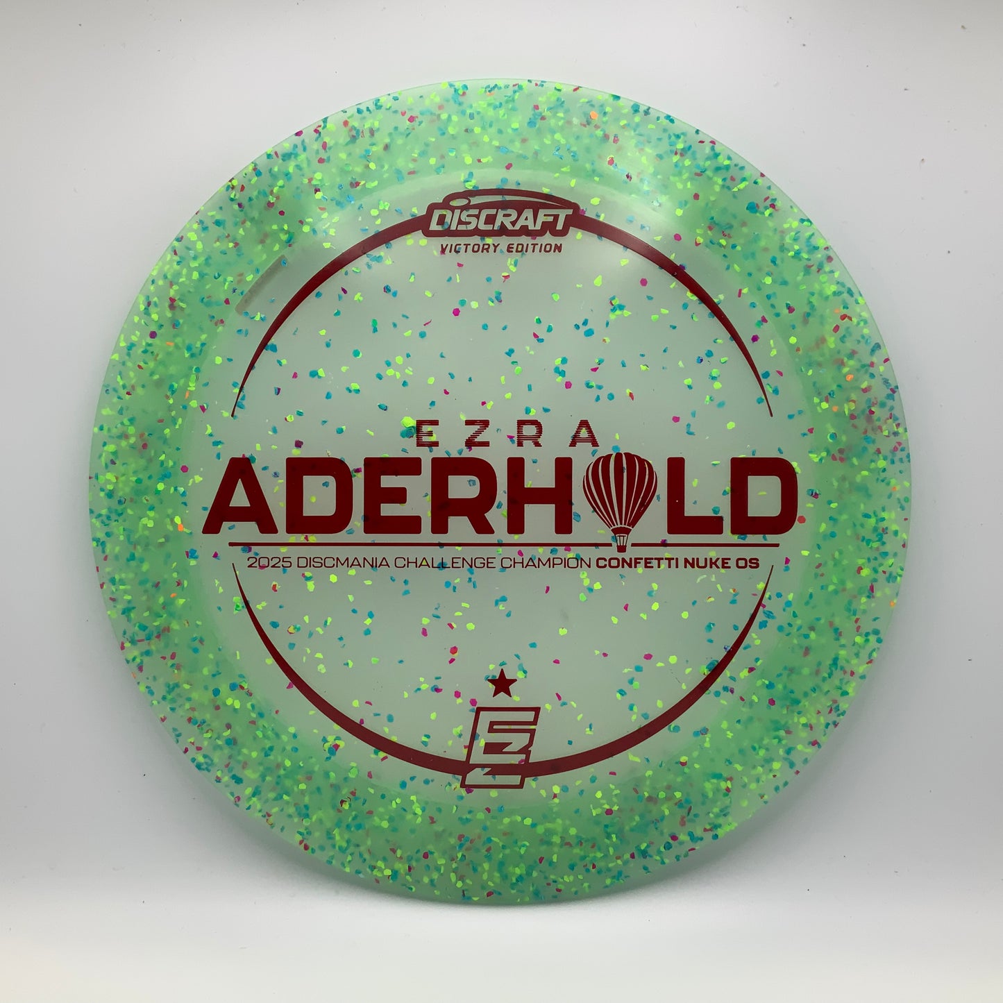Discraft Nuke OS - Ezra Aderhold Victory Edition Z FLX Confetti #7 - 173-174 - Astro Discs TX - Houston Disc Golf